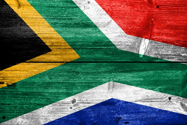 Bandera de Sudáfrica pintada sobre madera vieja textura del tablón — Foto de Stock