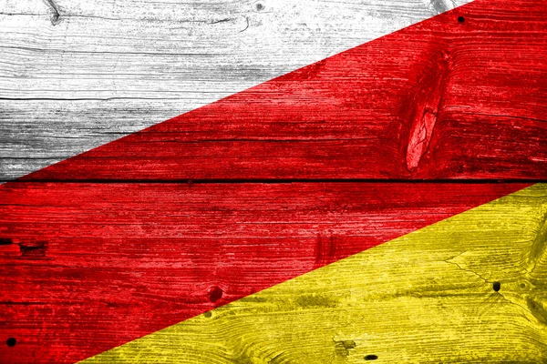 South Ossetia Flag painted on old wood plank texture — Stock Photo, Image