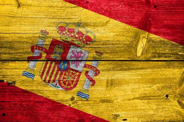 Bandera de España pintada sobre madera vieja textura del tablón — Foto de Stock