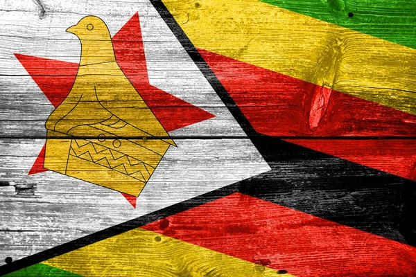 Zimbabwe Flag malet på gamle træ planke tekstur - Stock-foto