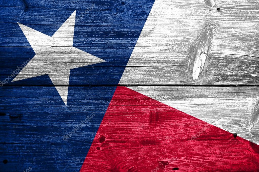 Texas State Flag painted on old wood plank texture