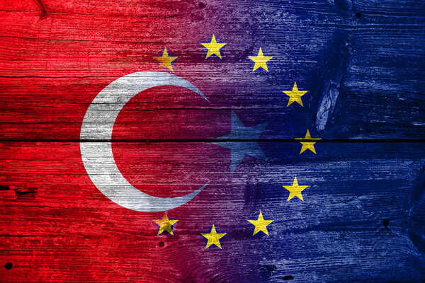 Turkey and European Union Flag painted on old wood plank texture