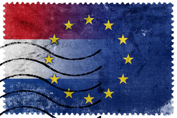 Nederland en de vlag van de Europese Unie - oude postzegel — Stockfoto