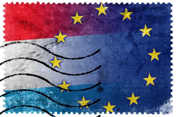 Luxemburg en de vlag van de Europese Unie - oude postzegel — Stockfoto