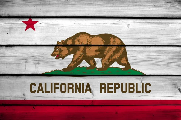 लकड़ी पृष्ठभूमि पर कैलिफोर्निया राज्य ध्वज — स्टॉक फ़ोटो, इमेज