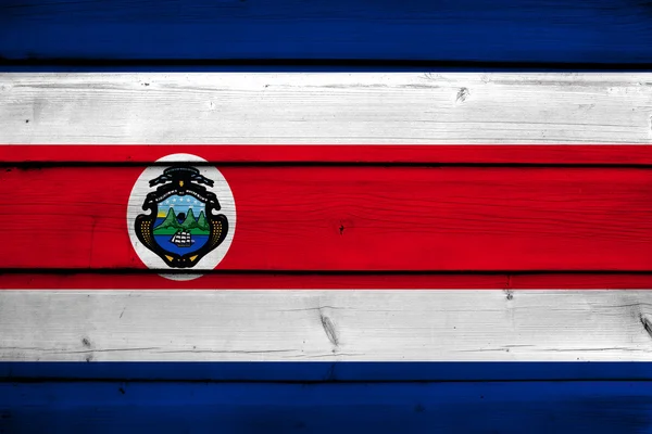 Costa rica flagga på trä bakgrund — Stockfoto