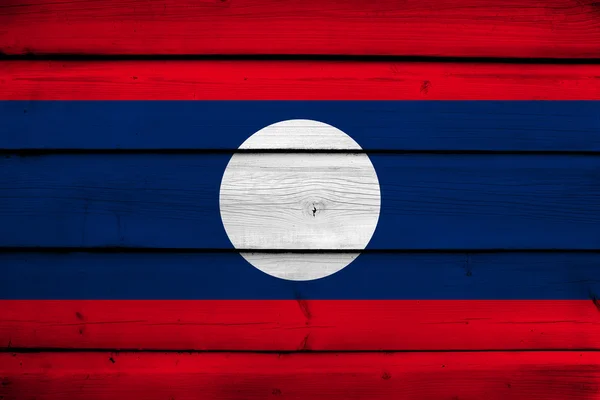 Laos bayrağı ahşap zemin üzerinde — Stok fotoğraf