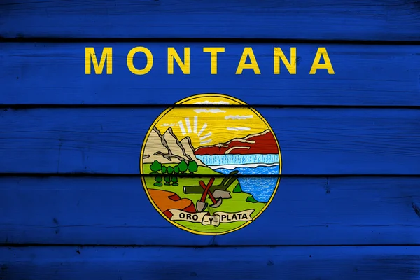 Bandera Estatal de Montana sobre fondo de madera — Foto de Stock