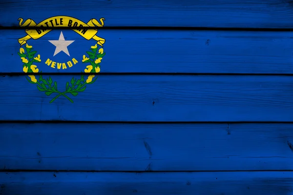 Nevada State Flagge auf Holz Hintergrund — Stockfoto