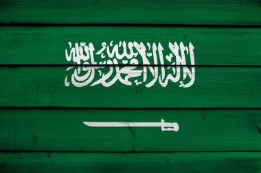 ahşap zemin üzerine Suudi Arabistan bayrağı