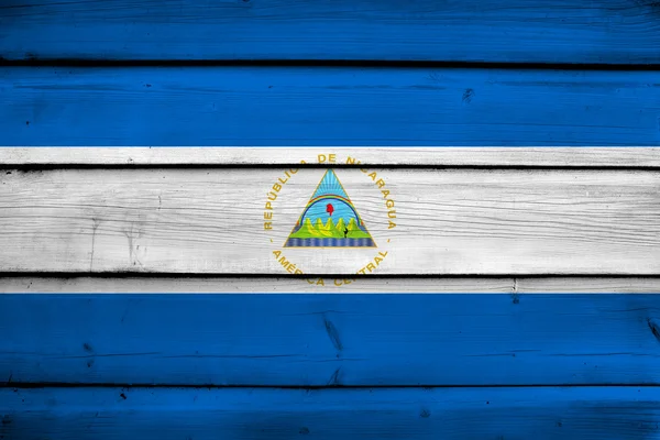 Nicaragua Flag on wood background — Stock Photo, Image