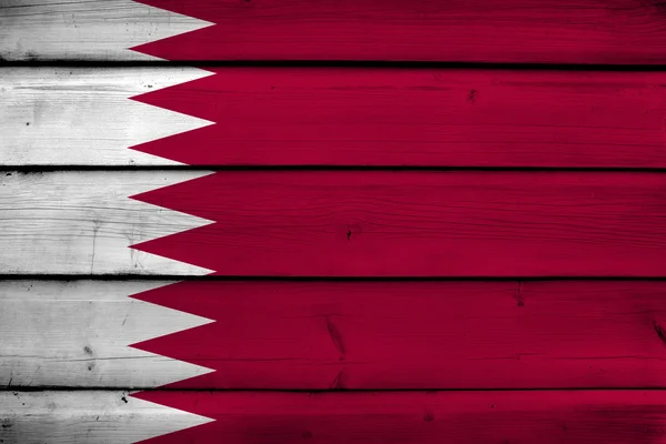 Qatar Flag on wood background — Stock Photo, Image