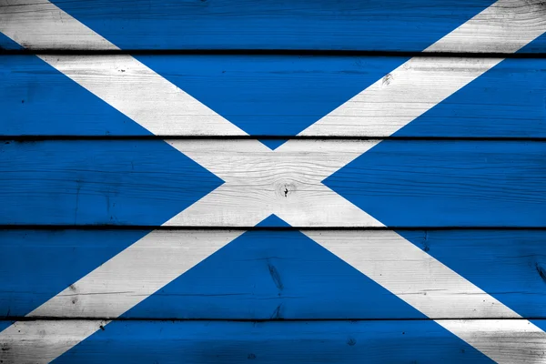 Bandera de Escocia sobre fondo de madera — Foto de Stock