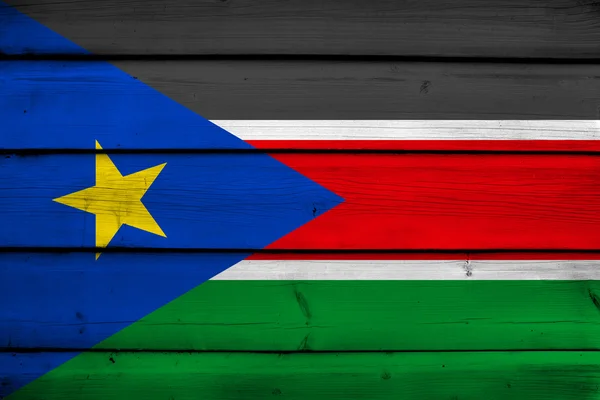 Sudán del Sur Bandera sobre fondo de madera —  Fotos de Stock
