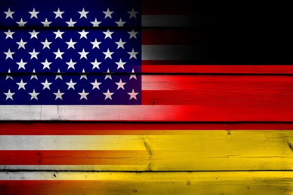 USA and Germany Flag on wood background — Stock Photo, Image