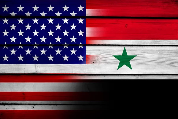 USA a vlajky Sýrie na pozadí — Stock fotografie