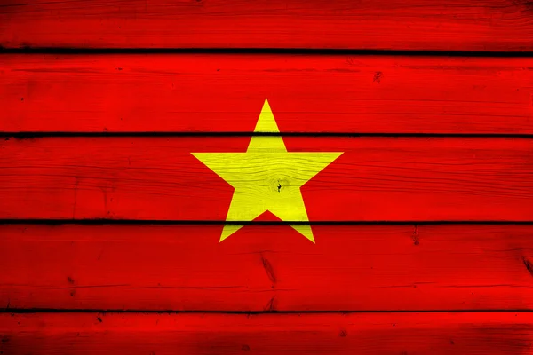 Bandera de Vietnam sobre fondo de madera —  Fotos de Stock