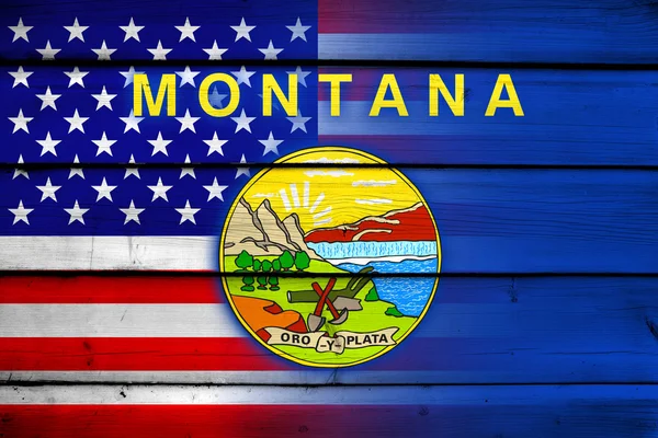 Bandera de Estados Unidos y Montana sobre fondo de madera —  Fotos de Stock