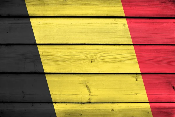 Bandera de Bélgica sobre fondo de madera — Foto de Stock