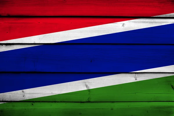 Gambia Flagge auf Holz Hintergrund — Stockfoto