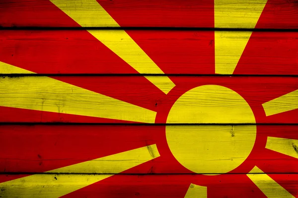 Makedonya bayrak ahşap zemin üzerinde — Stok fotoğraf