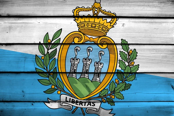 San Marino Flagge auf Holz Hintergrund — Stockfoto