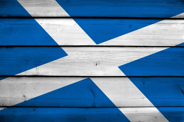 Bandera de Escocia sobre fondo de madera — Foto de Stock