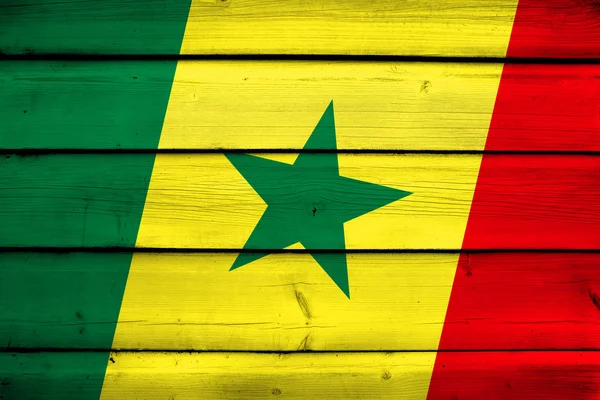 Senegal vlag op hout achtergrond — Stockfoto