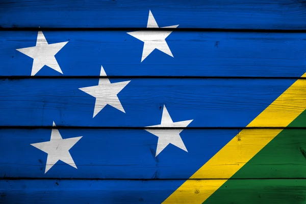 Vlag van de Salomonseilanden op hout achtergrond — Stockfoto