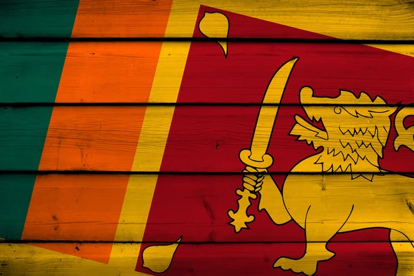 木製の背景にスリランカの旗 — ストック写真