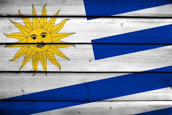 Ahşap zemin üzerinde Uruguay bayrağı — Stok fotoğraf