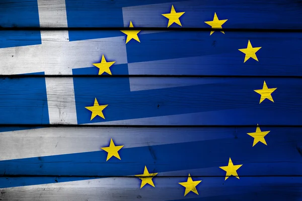 Griekenland en de vlag van de Europese Unie op hout achtergrond — Stockfoto