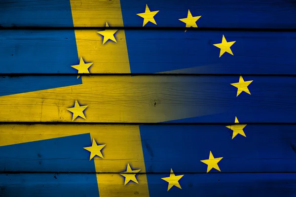 Sweden and European Union Flag on wood background — Stock Photo, Image