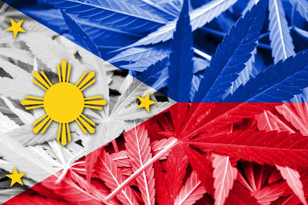 Philippines Flag on cannabis background. Drug policy. Legalization of marijuana — Stock Photo, Image