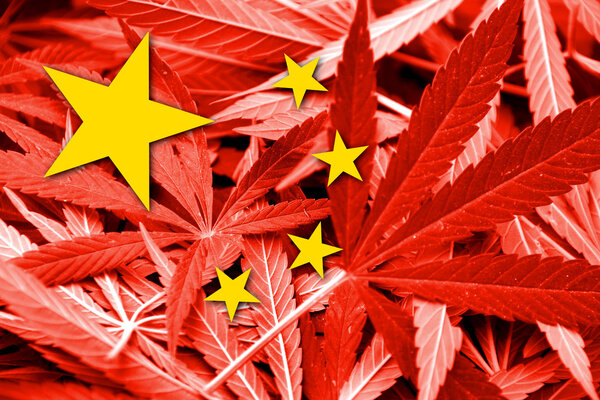 China Flag on cannabis background. Drug policy. Legalization of marijuana