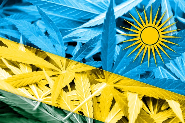 Σημαία της Ρουάντα σε φόντο κάνναβης. Πολιτικής για τα ναρκωτικά. Νομιμοποίηση της μαριχουάνας — Φωτογραφία Αρχείου