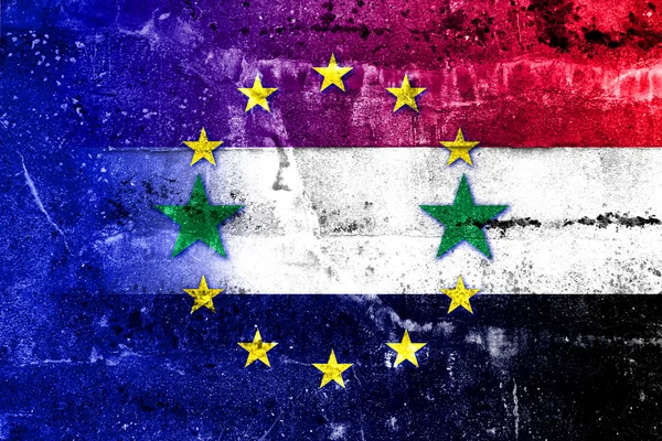 Bandera de la Unión Europea y Siria pintada en la pared grunge — Foto de Stock