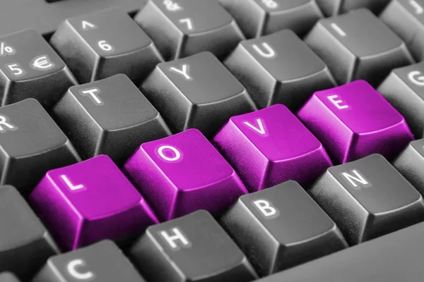 Słowo miłość napisane z przycisków klawiatury — Zdjęcie stockowe