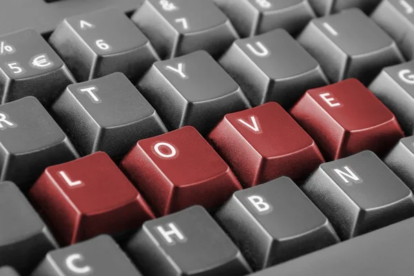 Wortliebe geschrieben mit Tastatur-Tasten — Stockfoto