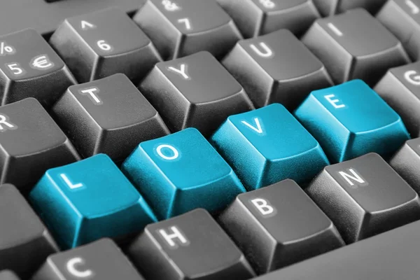 Word love written with keyboard buttons — Stock Photo, Image