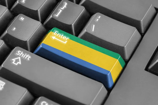 Eingabetaste mit Gabonenfahne — Stockfoto