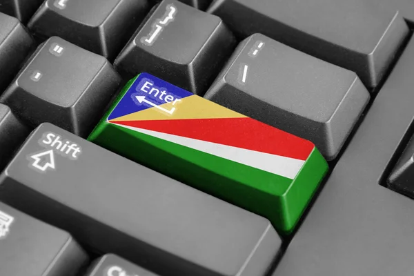ENTER-knop met de vlag van de Seychellen — Stockfoto