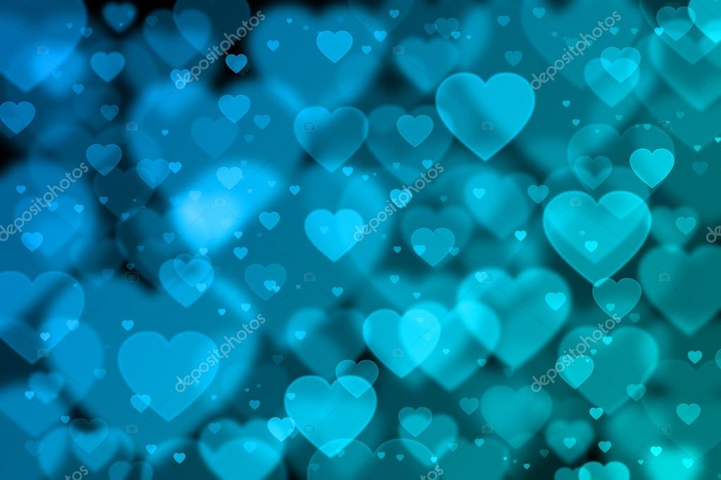Blue hearts background with bokeh effect Stock Photo by ©PromesaStudio 91072750