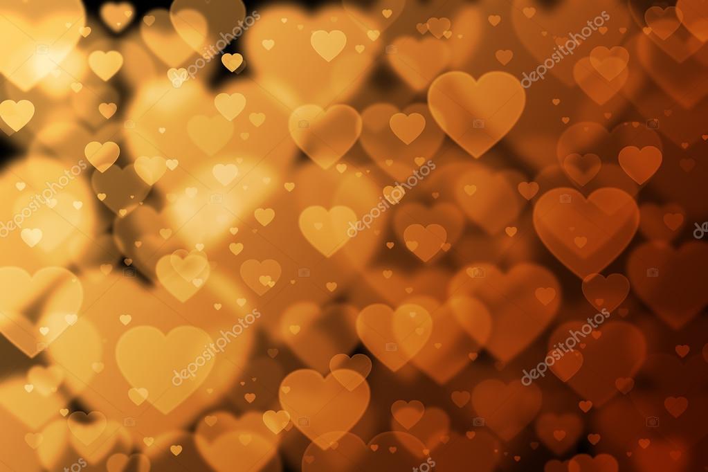 Orange und braune Herzen Hintergrund mit Bokeh-Effekt — Stockfoto