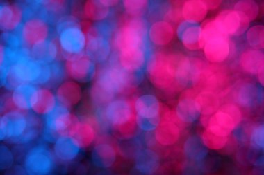 Mavi, kırmızı, çok renkli, odakları kesilmiş, arka plan şenlikli Bokeh bayramı kutlaması.