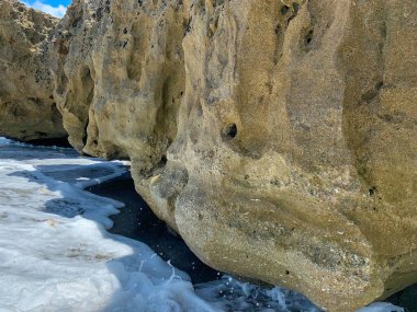 Rocks on the beach at Blowing Rock Preserve in Jupiter, Florida