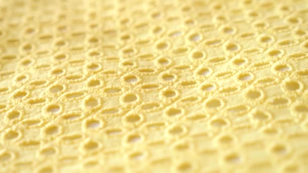 Fabric as background. 4k, slow motion, yellow knitted fabric. — Stock Video