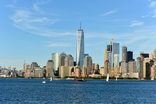 View of the New York City skyline on a summer day.