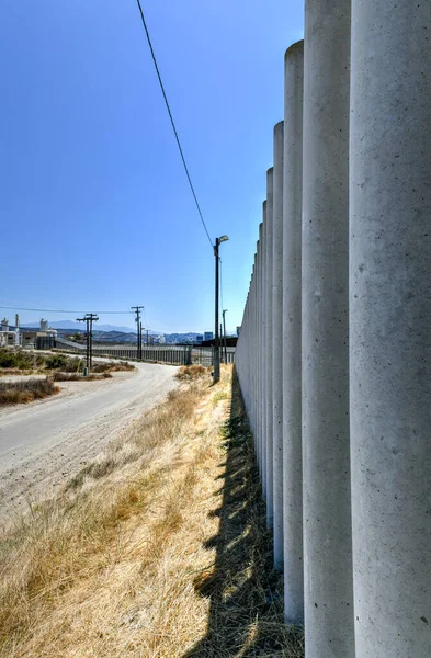 The Border Wall between the United States and Mexico from San Diego, California looking towards Tijuana, Mexico.