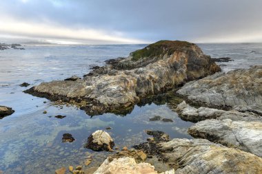 Kaliforniya, Pebble Sahili kıyısında Sunset Point 'in 17 mil boyunca uzanan manzarası